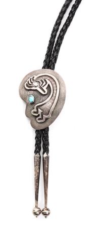 A Navajo Silver and Turquoise Bolo, P. Yellowhorse Height 2 1/4 x width 1 3/4 inches.