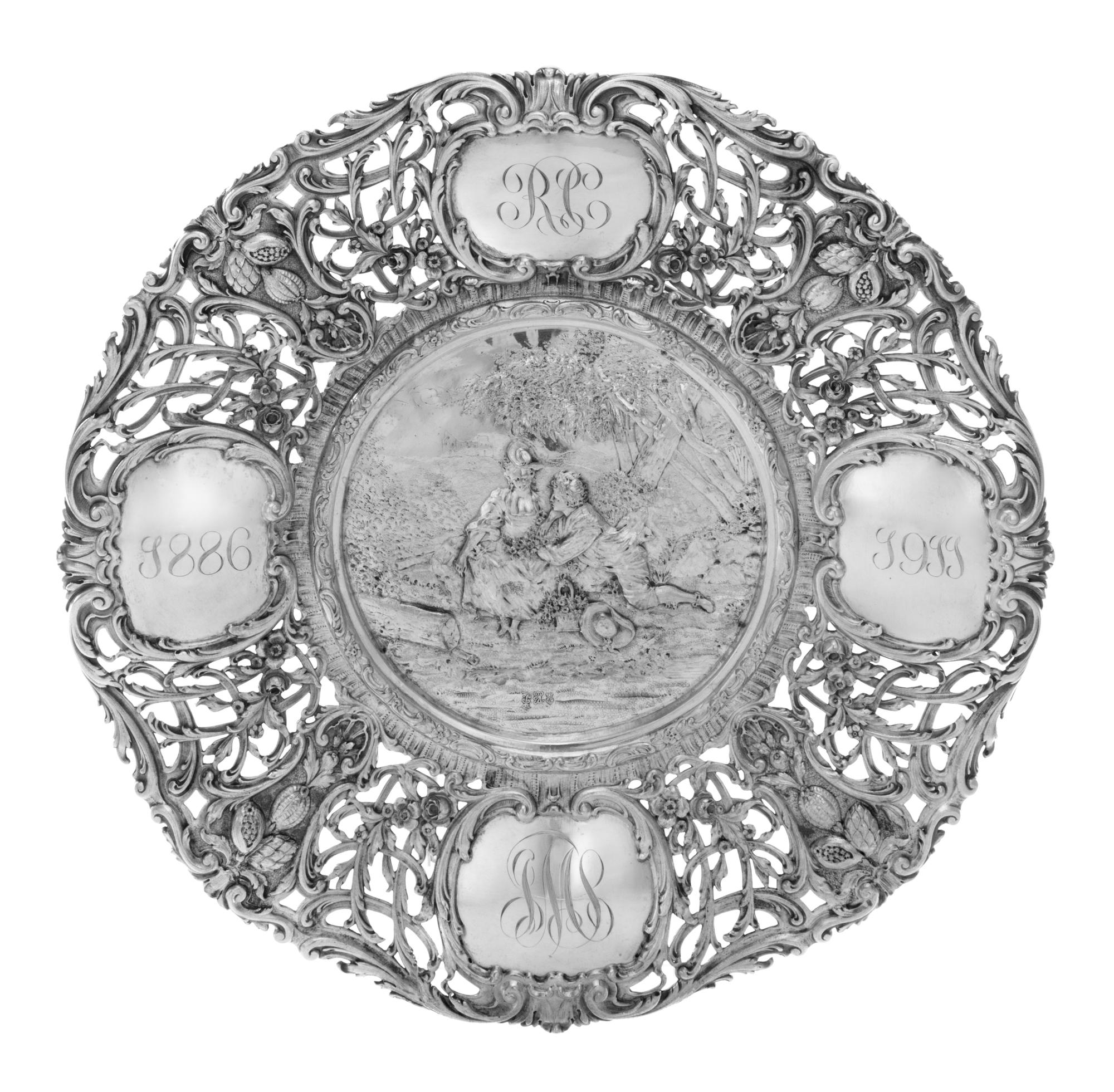 A German Silver Pierced and Repousse Commemorative Tray, George Roth & Co., Hanau, worked to show floral, foliate and berry decoration