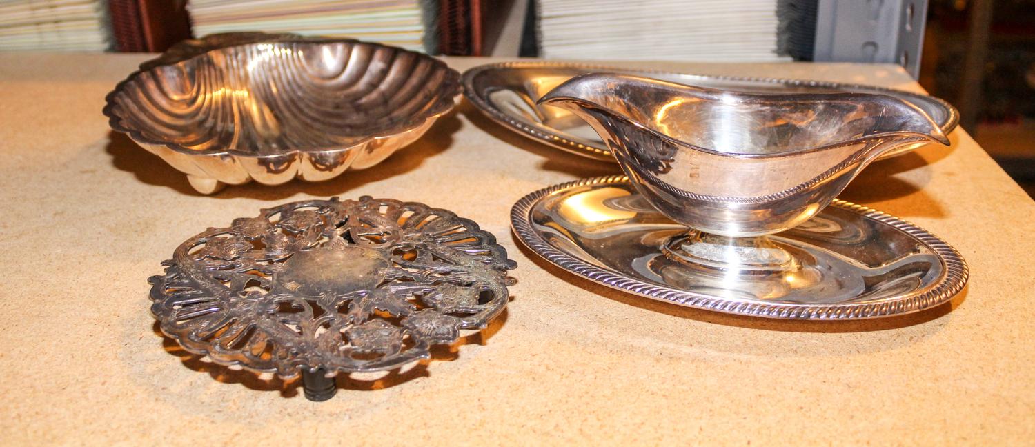 A Group of American Silver-Plate Serving Dishes, , comprising a large circular platter, twin-dish server, two trivet stands, scallop fo