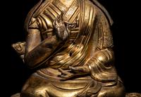 A Tibetan Gilt Bronze Repoussé Seated Figure of Tsongkhapa