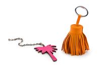 An Hermes Orange Leather Carmen Tassel Key Chain,