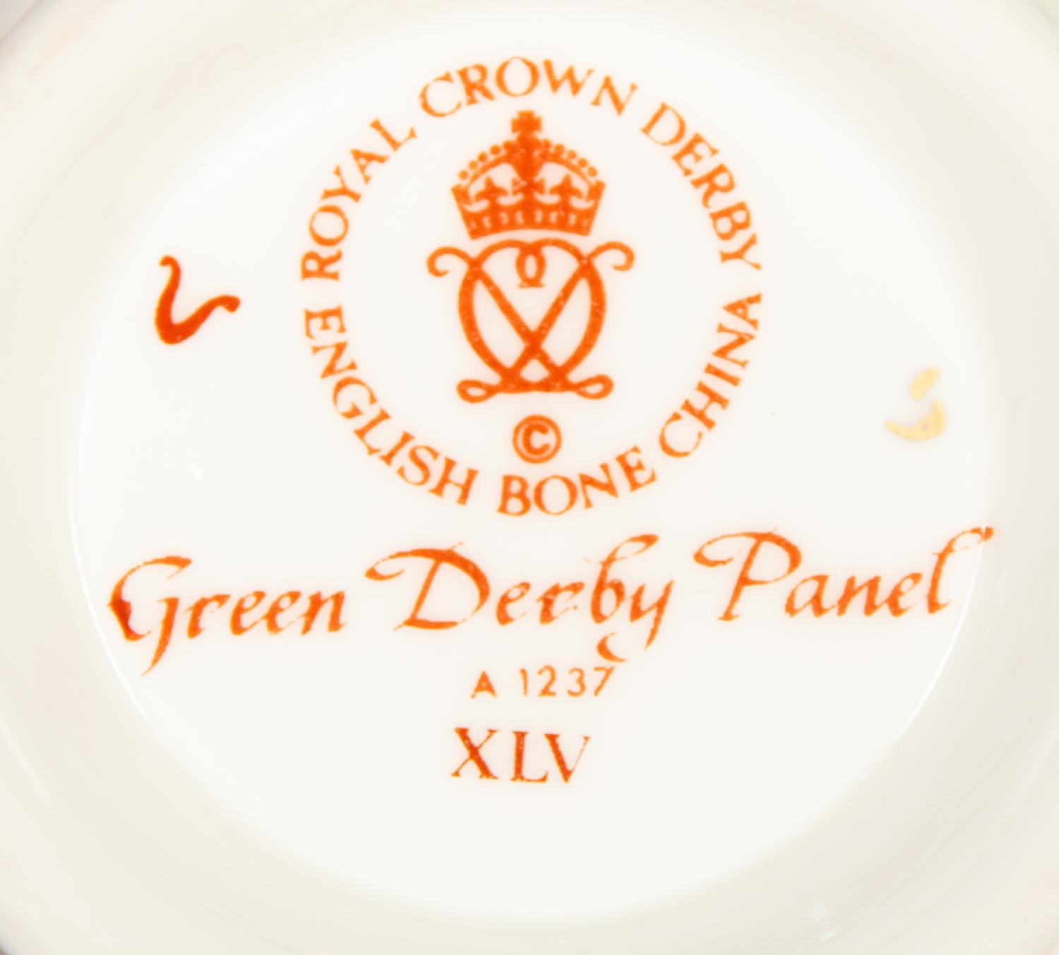 A Royal Crown Derby Porcelain Dinner Service in the Green Derby Panel Pattern