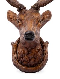 A Black Forest Carved Stag Head