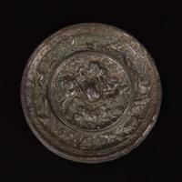 An unusual Chinese "Beast and Grapes" bronze mirror 海兽葡萄纹铜镜 Tang dynasty ?