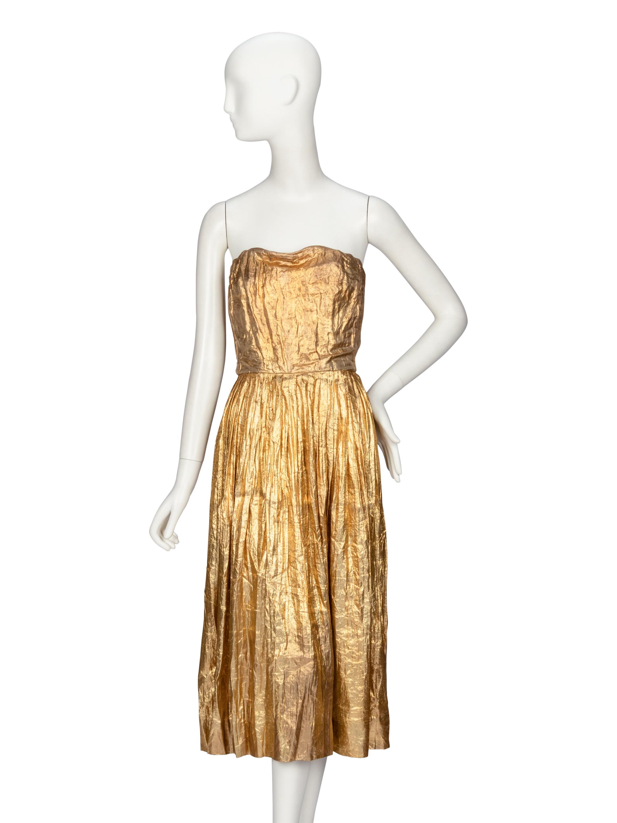 Traina-Norell, Gold Lamé Strapless Gown