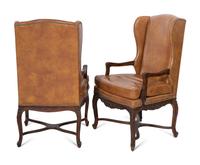 A Pair of Régence Style Leather-Upholstered Wingback Fauteils