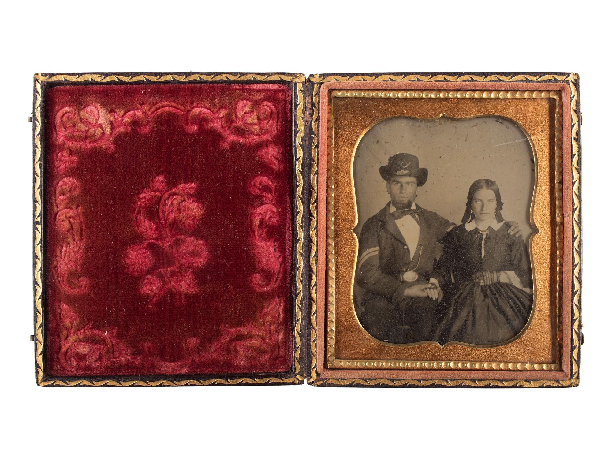 [CIVIL WAR]. Sixth plate ambrotype of Union infantry corporal with wife.