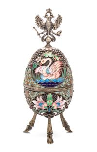 A Russian Silver and Enameled Egg, Dmitrii Aleksandrov Pastukhov, Moscow, 1908-1926, having a double-headed eagle crest over the swan d