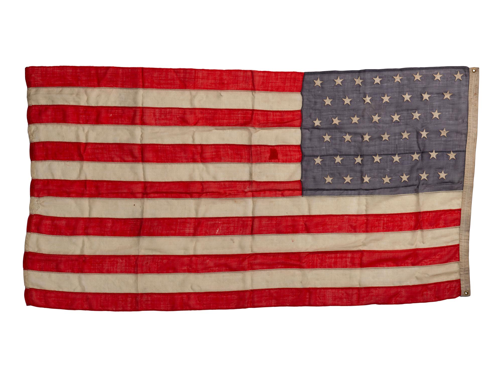 [CIVIL WAR]. A group of 2 American flags, incl. 44-star flag identified to “Camp 6 SoV ILL DIV USA” (Sons of Veterans, Illinois Division USA). [Ca 1891-1896].