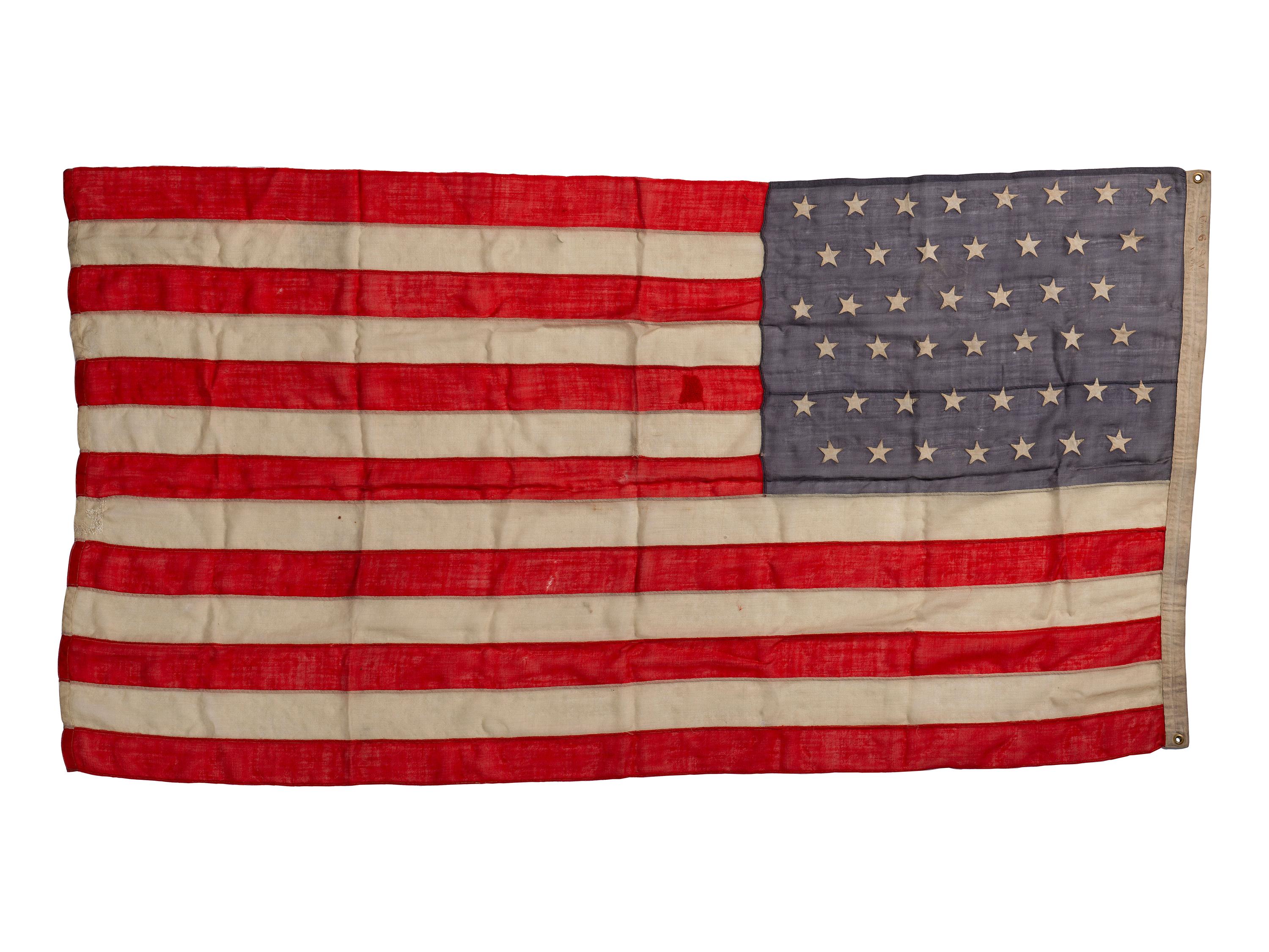 [CIVIL WAR]. A group of 2 American flags, incl. 44-star flag identified to “Camp 6 SoV ILL DIV USA” (Sons of Veterans, Illinois Division USA). [Ca 1891-1896].