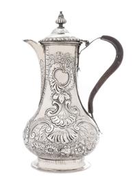 A George III Silver Coffee Pot, Louis Herne & Fras. Butty, London, 1762, the reeded finial above the domed lid with a gadroon rim, the