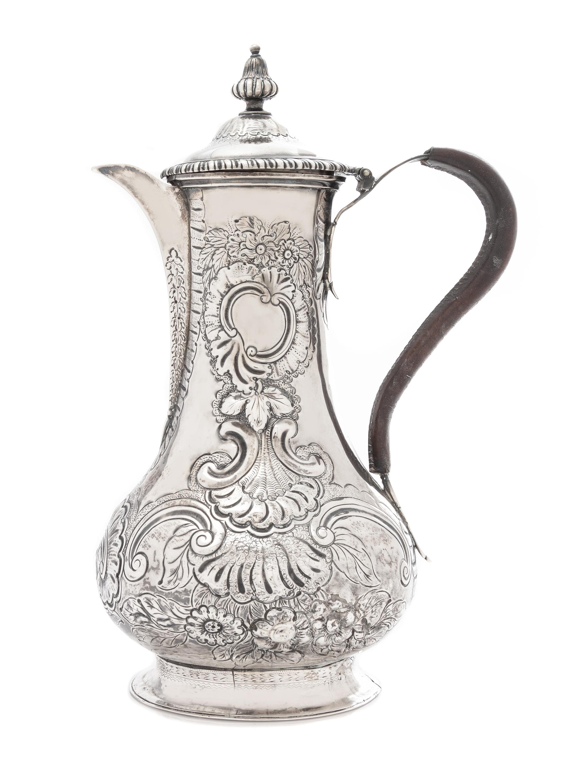 A George III Silver Coffee Pot, Louis Herne & Fras. Butty, London, 1762, the reeded finial above the domed lid with a gadroon rim, the