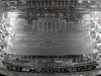 A Near Pair of Cut and Etched Glass Commemorative Covered Urns