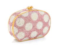A Judith Leiber Pale Pink Polka Dot Minaudiere, 5.25" x 3.75" x 1.25"; Strap drop 19".