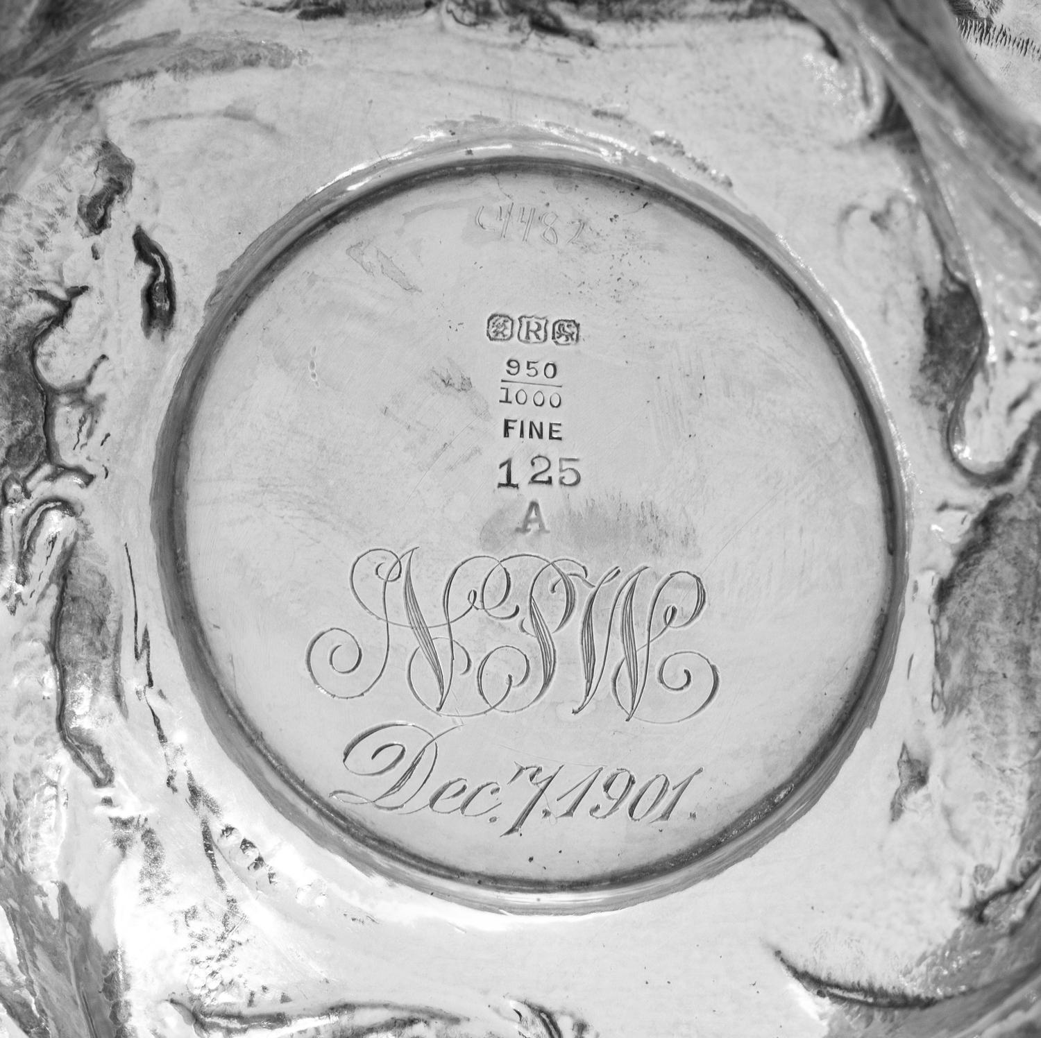 An American Silver Repoussé Eight-Piece Tea and Coffee Service