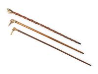 Three Carved Horn or Bone and Brass-Mounted Figural Canes