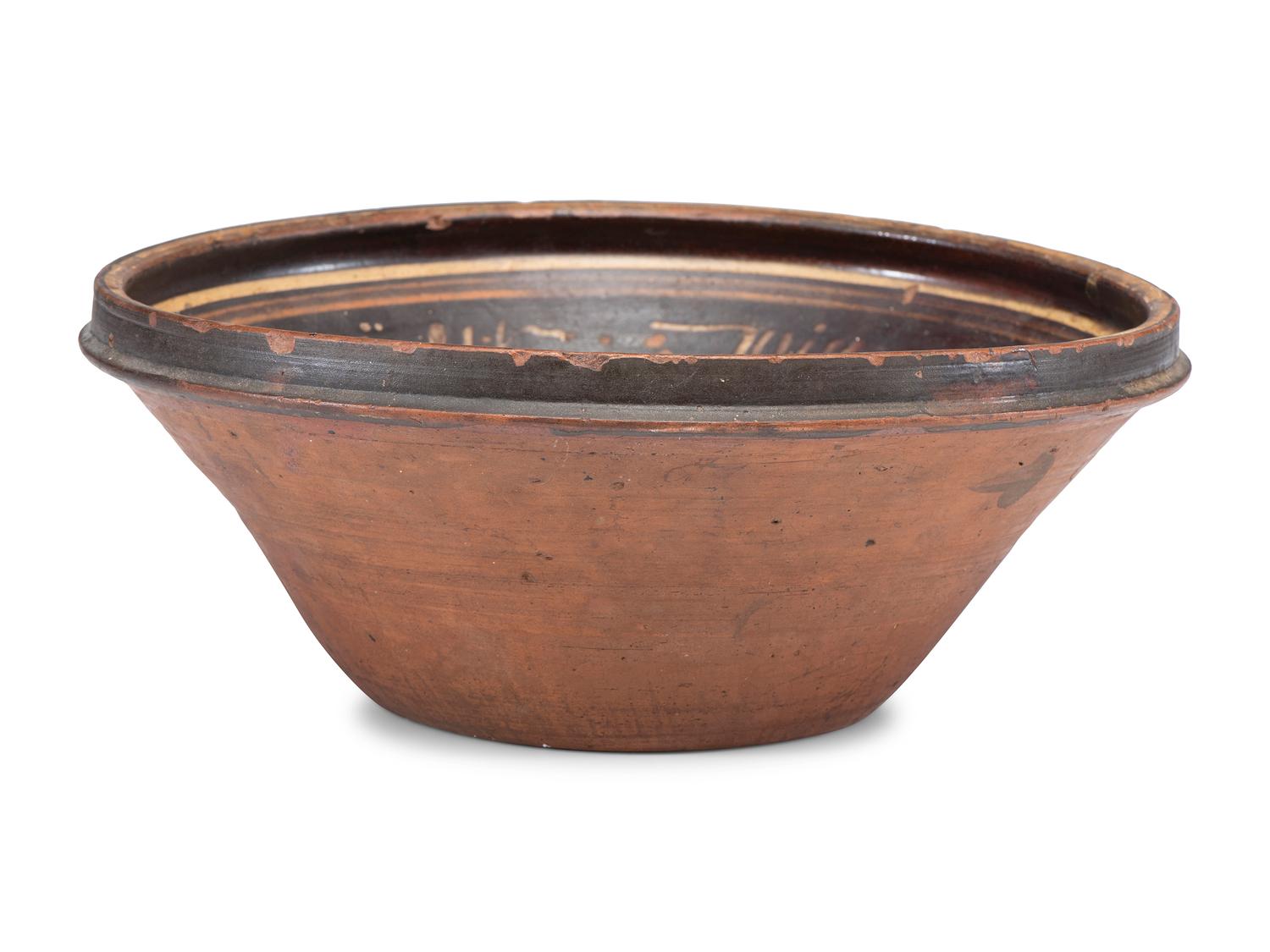 A Paint Decorated Redware Bowl