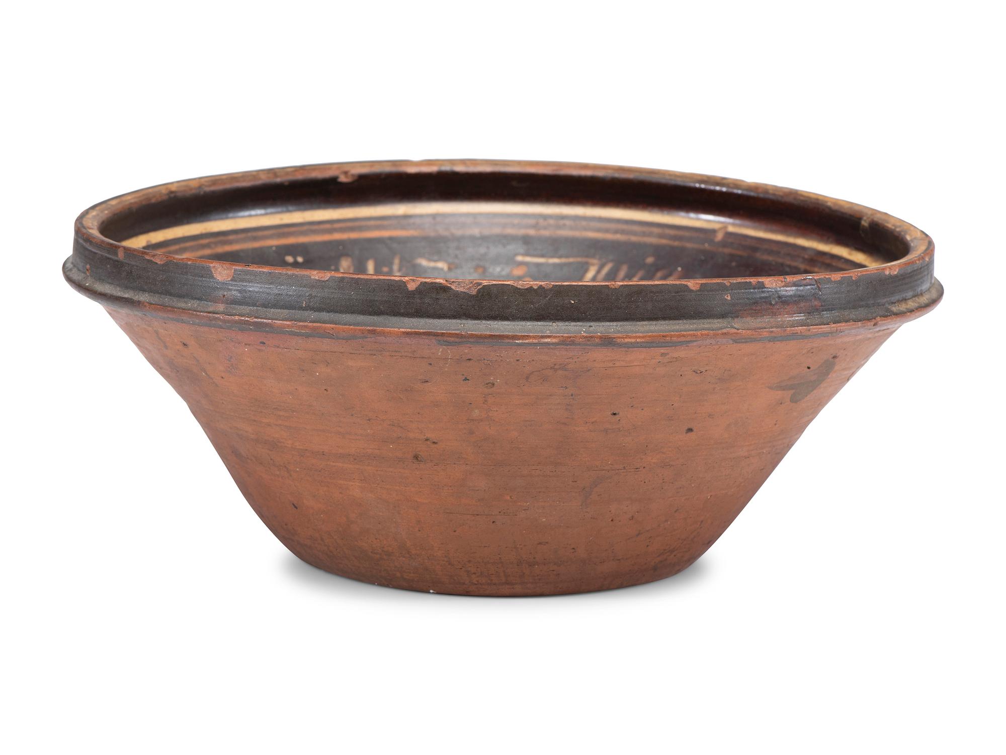 A Paint Decorated Redware Bowl