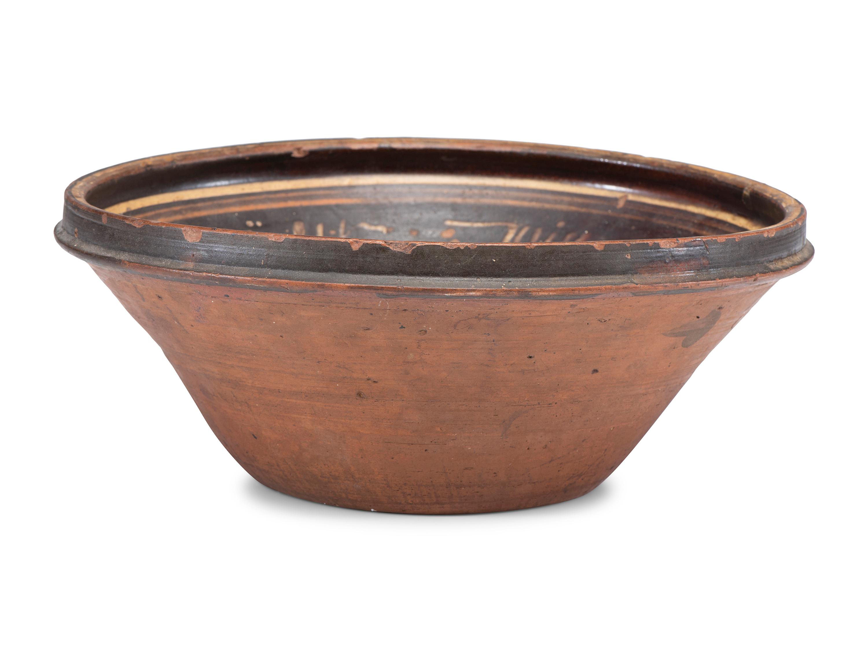 A Paint Decorated Redware Bowl