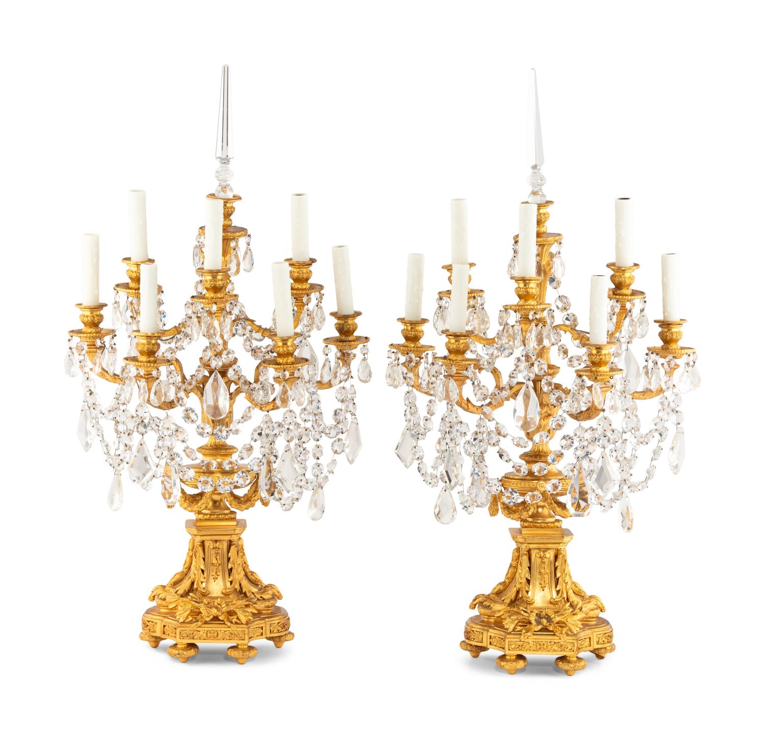 A Pair of French Gilt Bronze and Cut Glass Seven-Light Candelabra