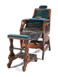 An Archer Velvet Upholstered Goose Neck Walnut Barber Chair and Footstool