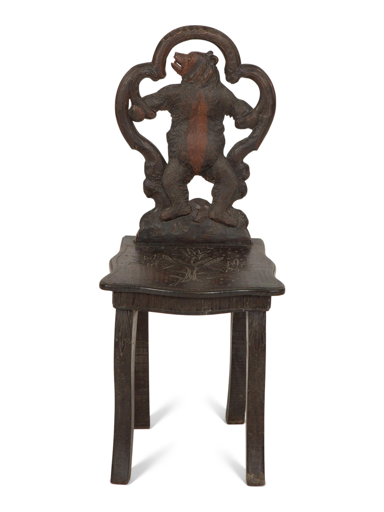 A Black Forest Carved Wood Child's Chair