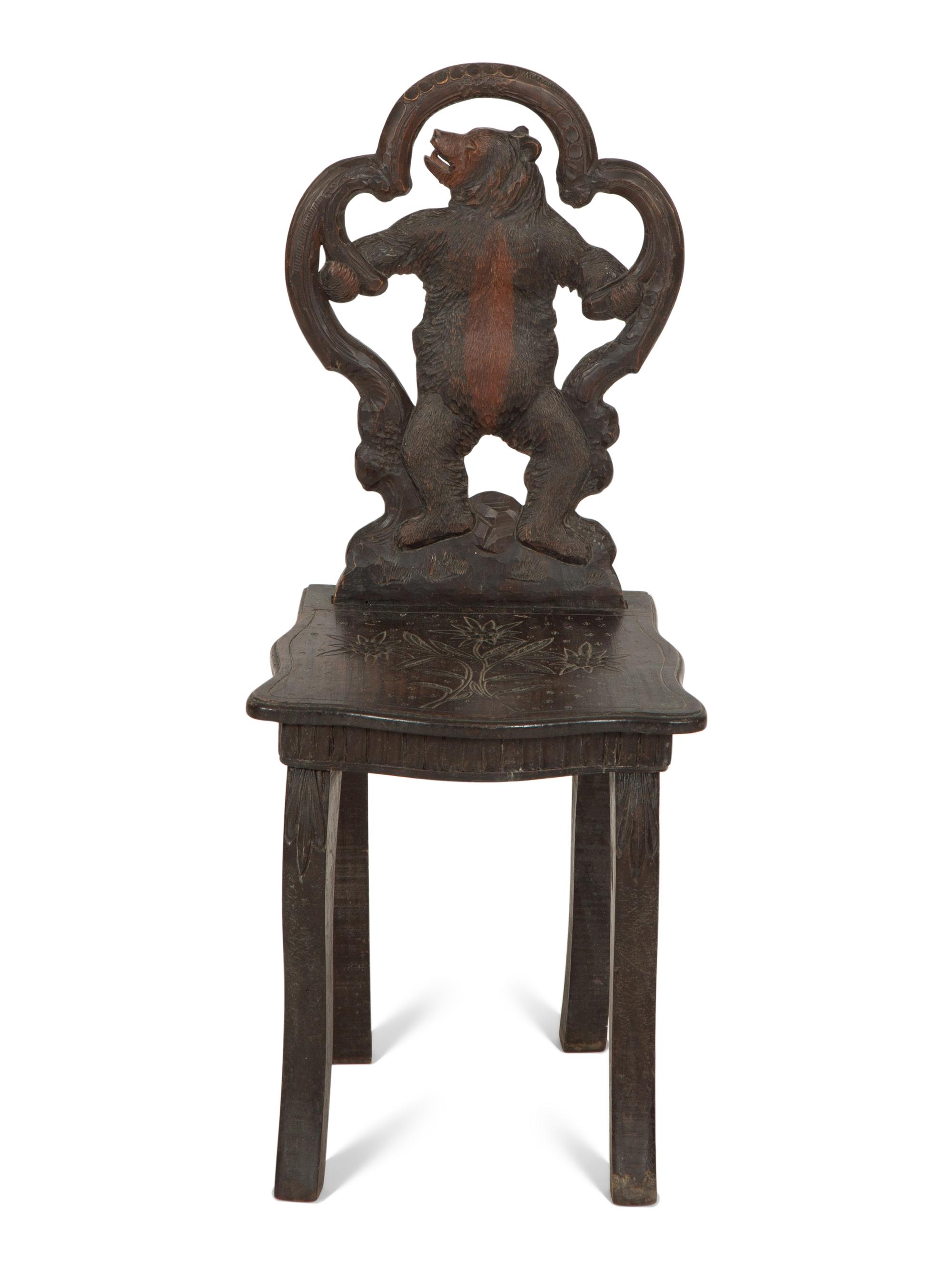 A Black Forest Carved Wood Child's Chair