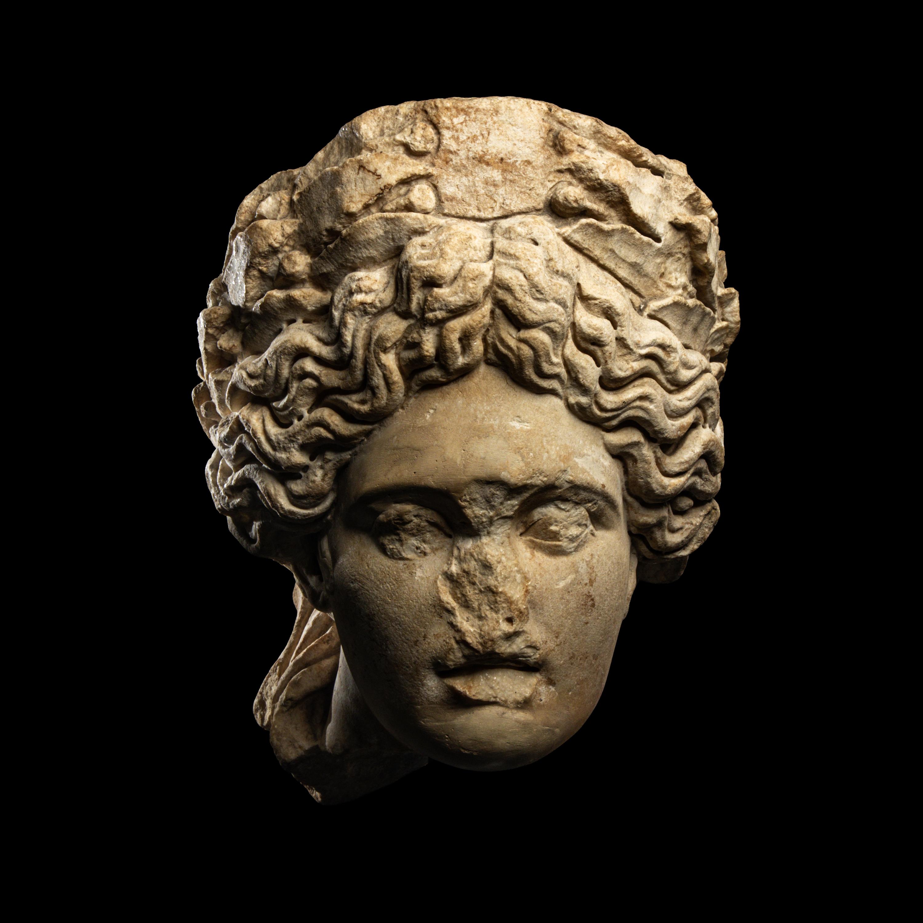 A Roman Marble Head of Apollo Citharoedus
