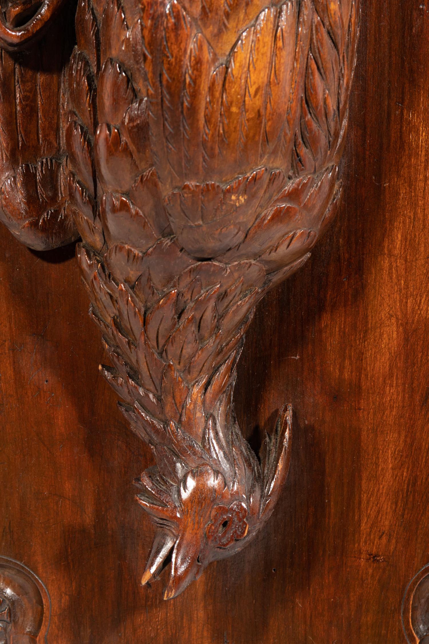 A Black Forest Carved Game Bird Wall Plaque