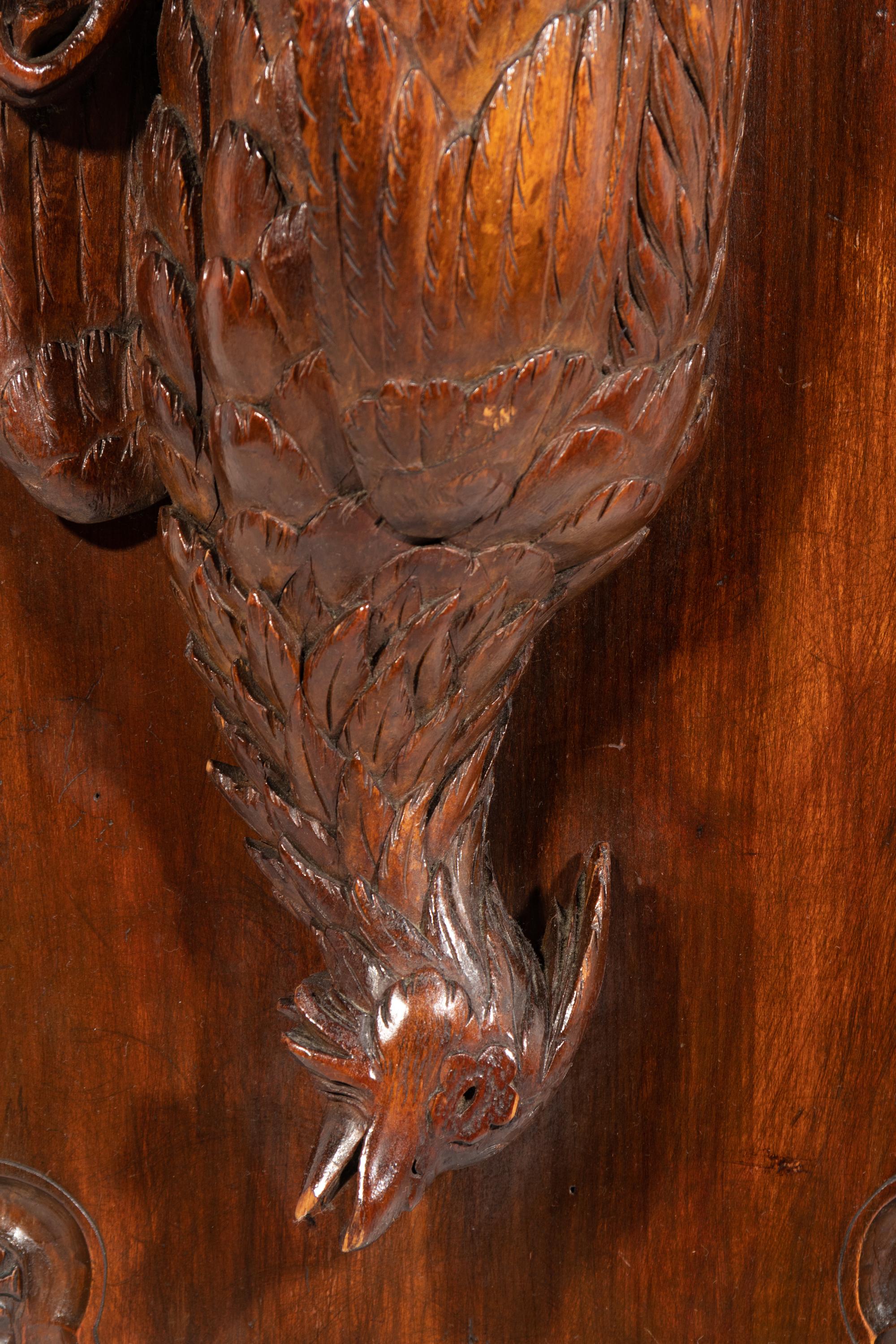 A Black Forest Carved Game Bird Wall Plaque