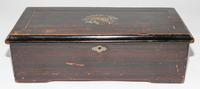 A Continental Cylinder Music Box. Height 6 x width 18 1/2 x depth 8 1/2 inches.