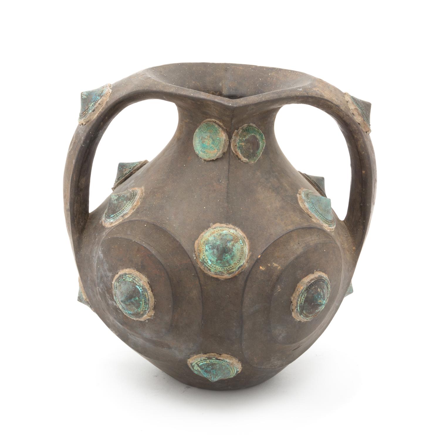 An Ethnographic Wood and Cast Metal Vessel Height 12 inches.