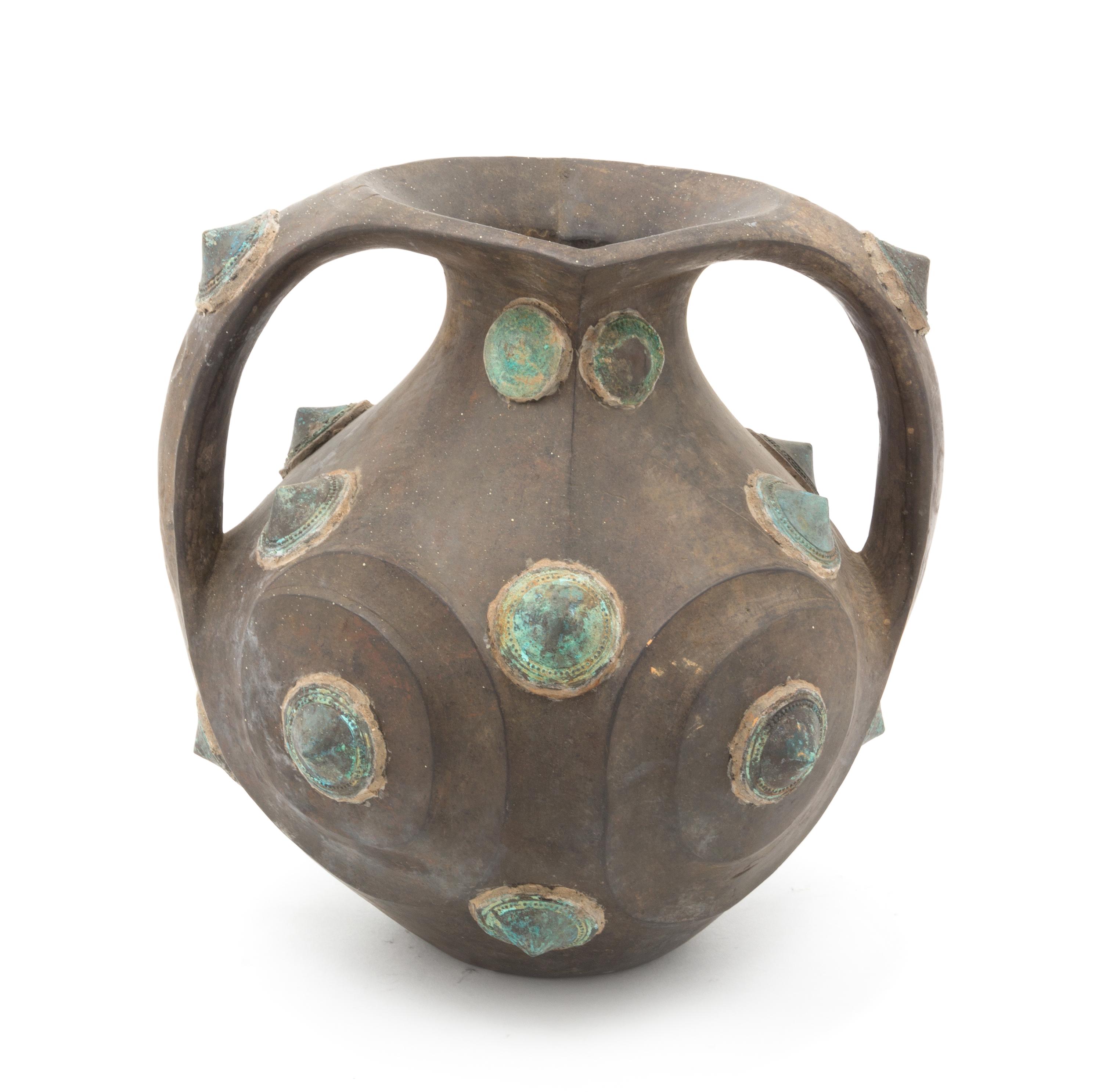 An Ethnographic Wood and Cast Metal Vessel Height 12 inches.