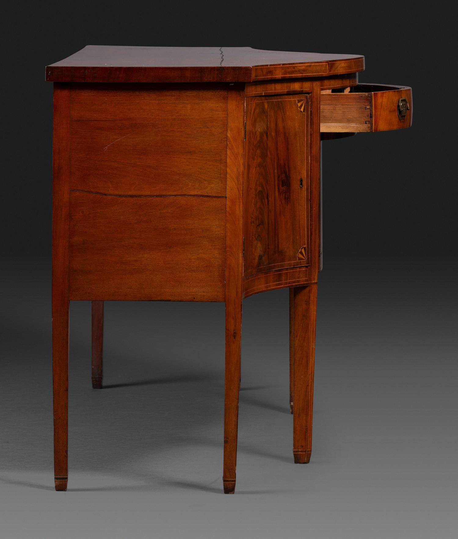 A Federal Fan-Inlaid and Figured Mahogany Serpentine Sideboard
