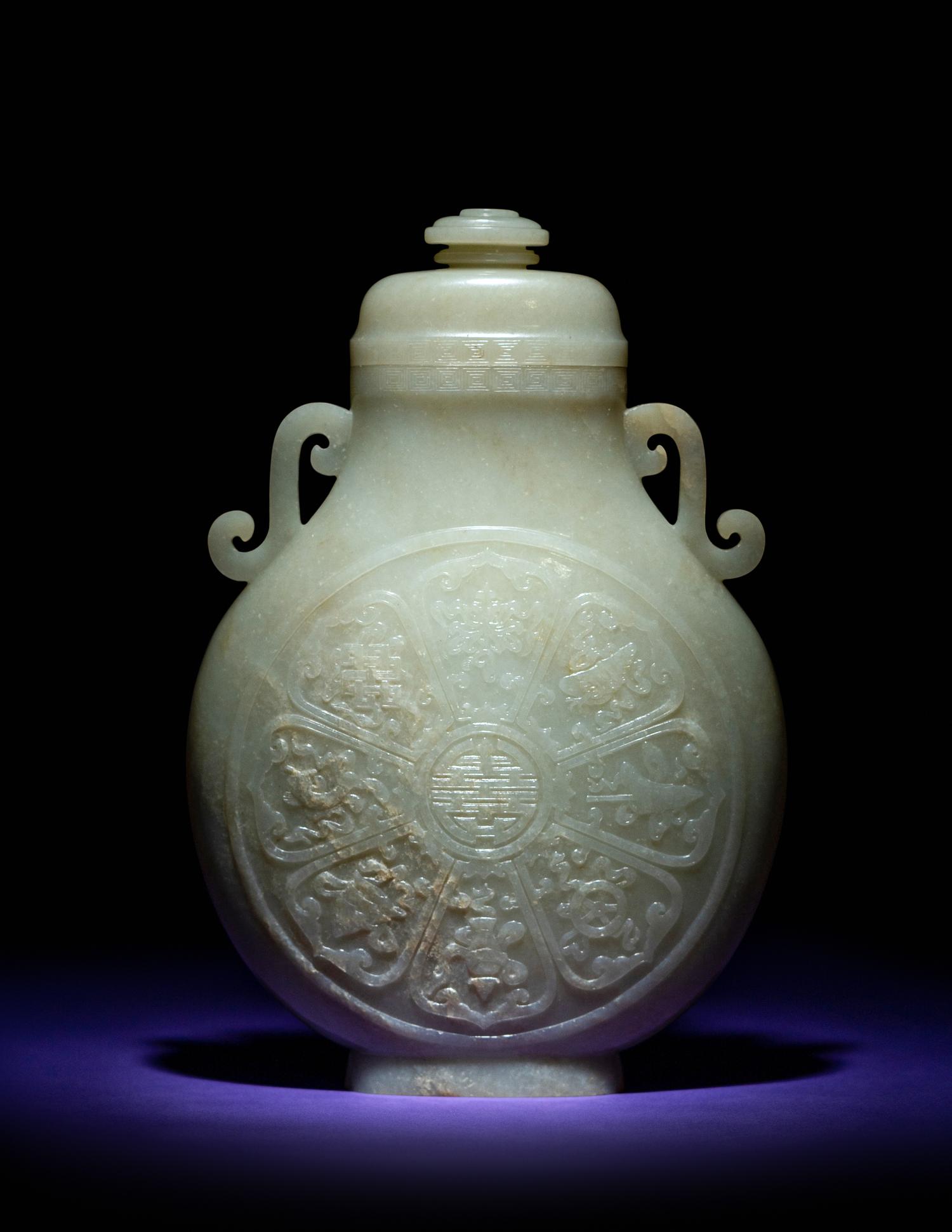 A Rare and Finely Carved Chinese White Jade Covered Vase