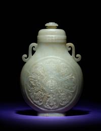 A Rare and Finely Carved Chinese White Jade Covered Vase
