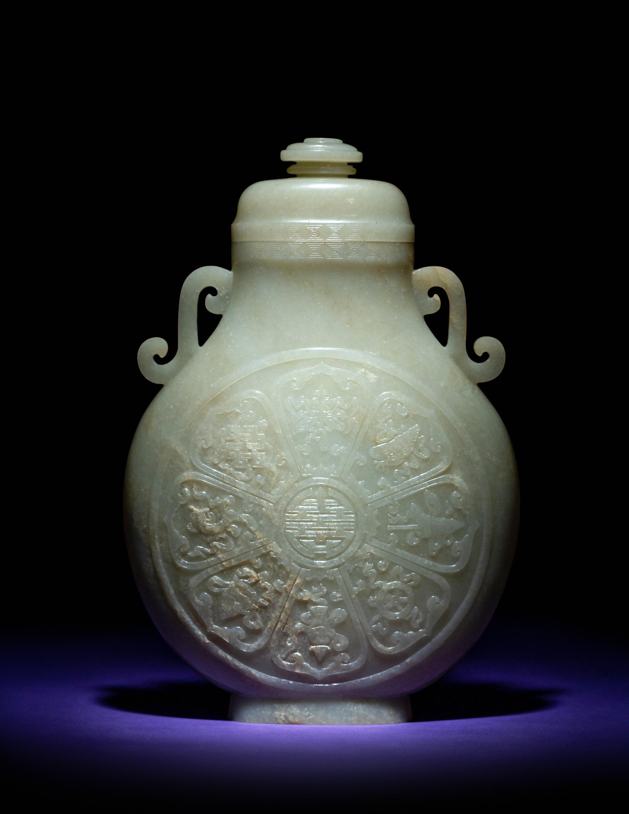 A Rare and Finely Carved Chinese White Jade Covered Vase