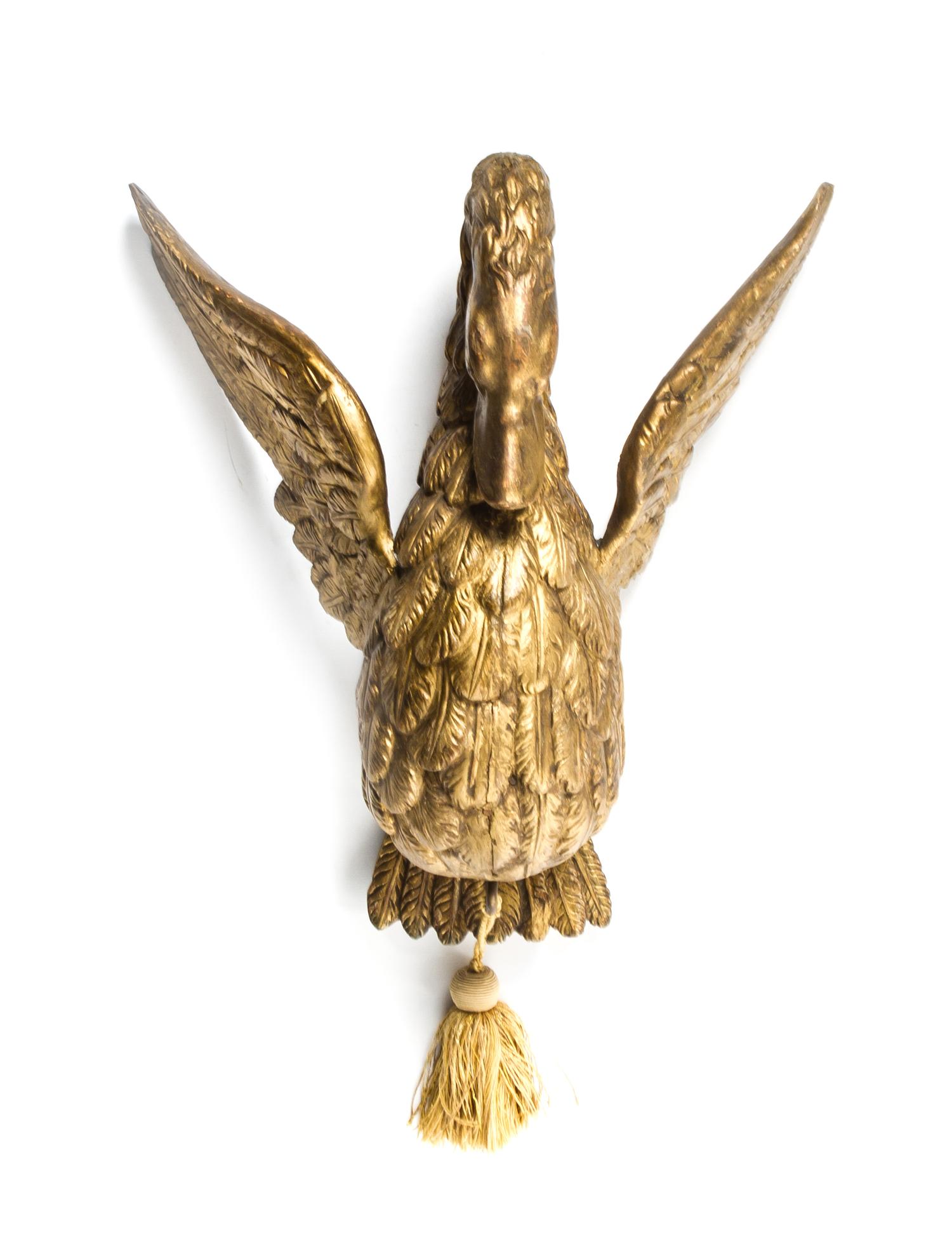 An Empire Giltwood Figural Corona, Height 14 1/4 inches.
