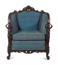 A Pair of Carved Walnut Armchairs in the Style of Karpen Bros.
