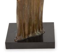 A Bronze Sculpture of a Standing Woman