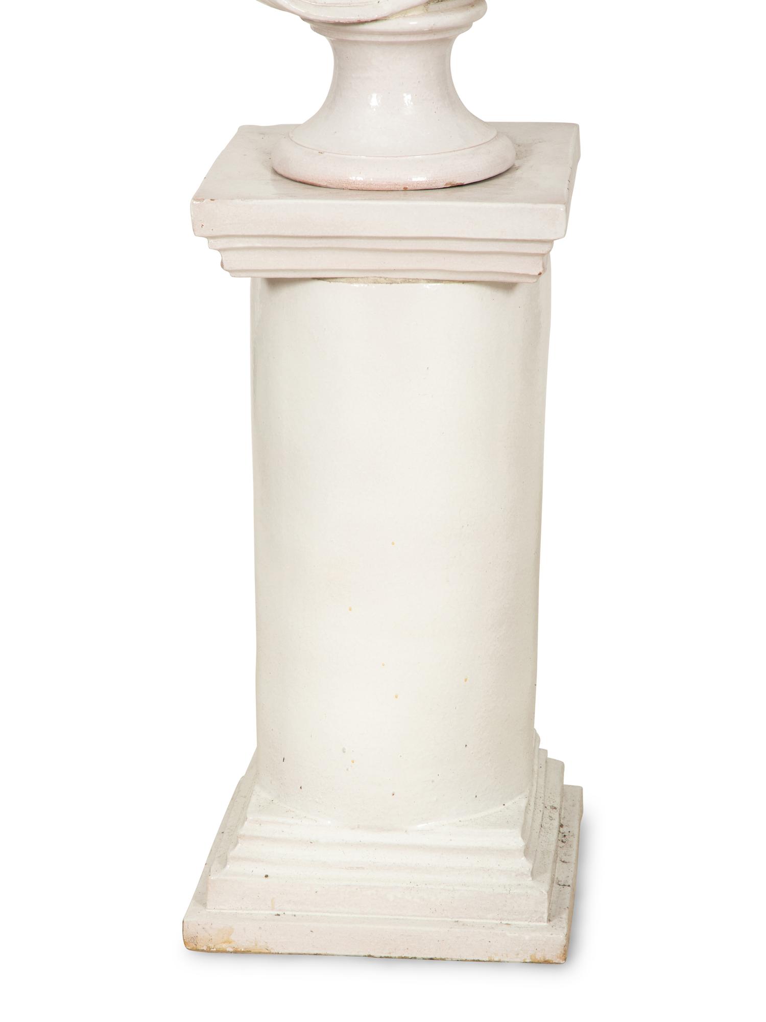 A Pair of Italian White Glazed Ceramic Busts on Pedestal Bases