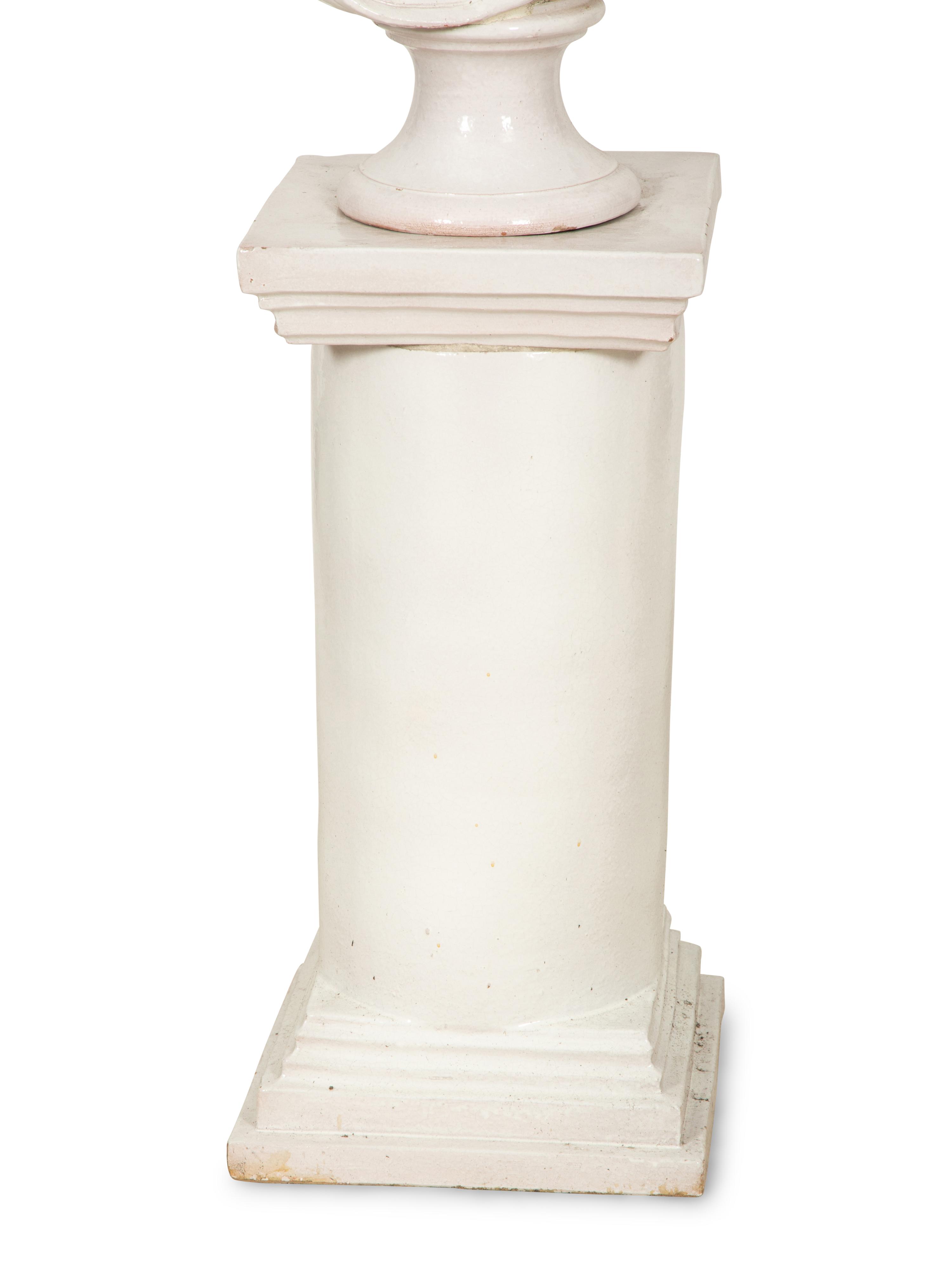 A Pair of Italian White Glazed Ceramic Busts on Pedestal Bases
