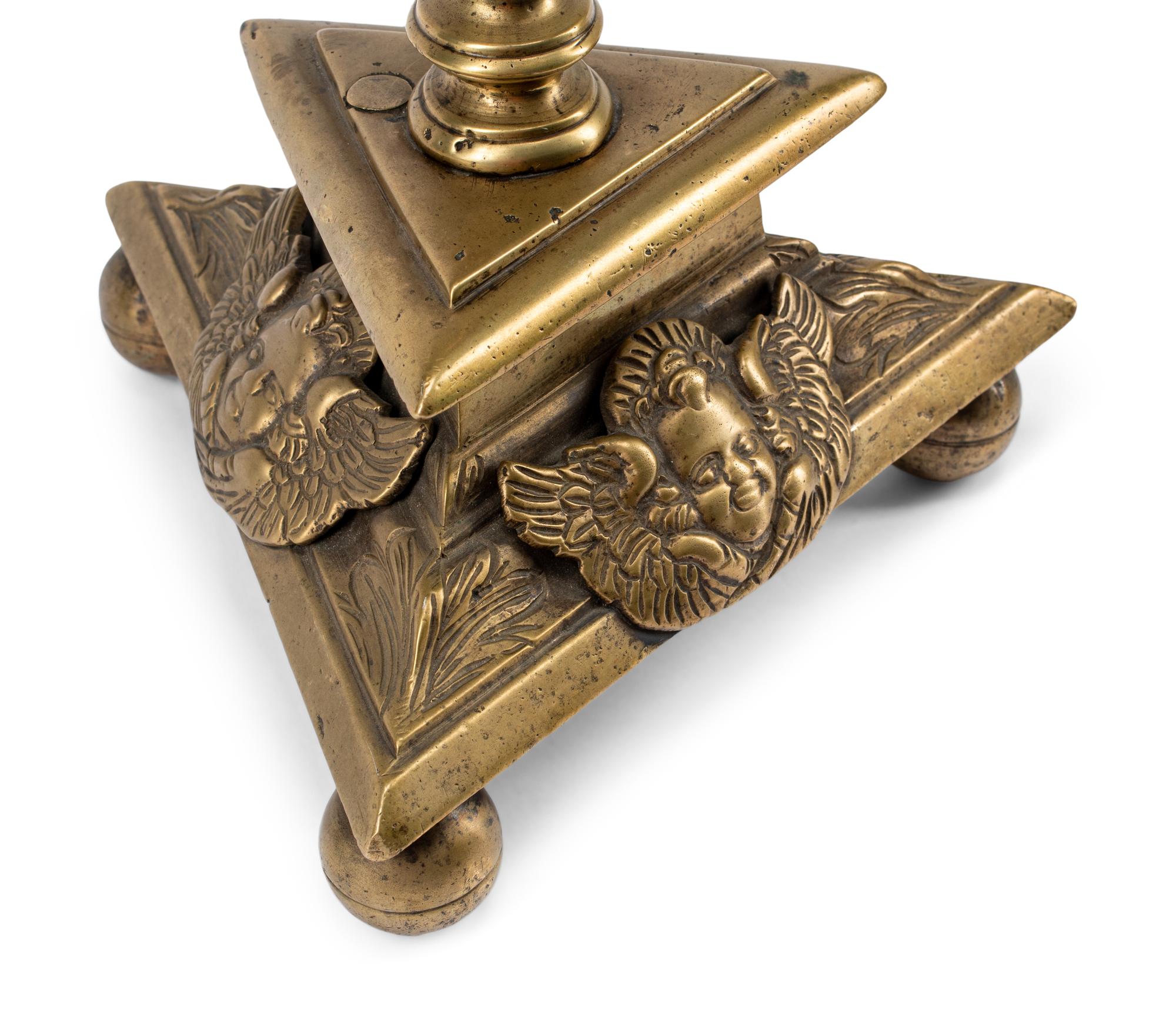 A Pair of Continental Brass Prickets