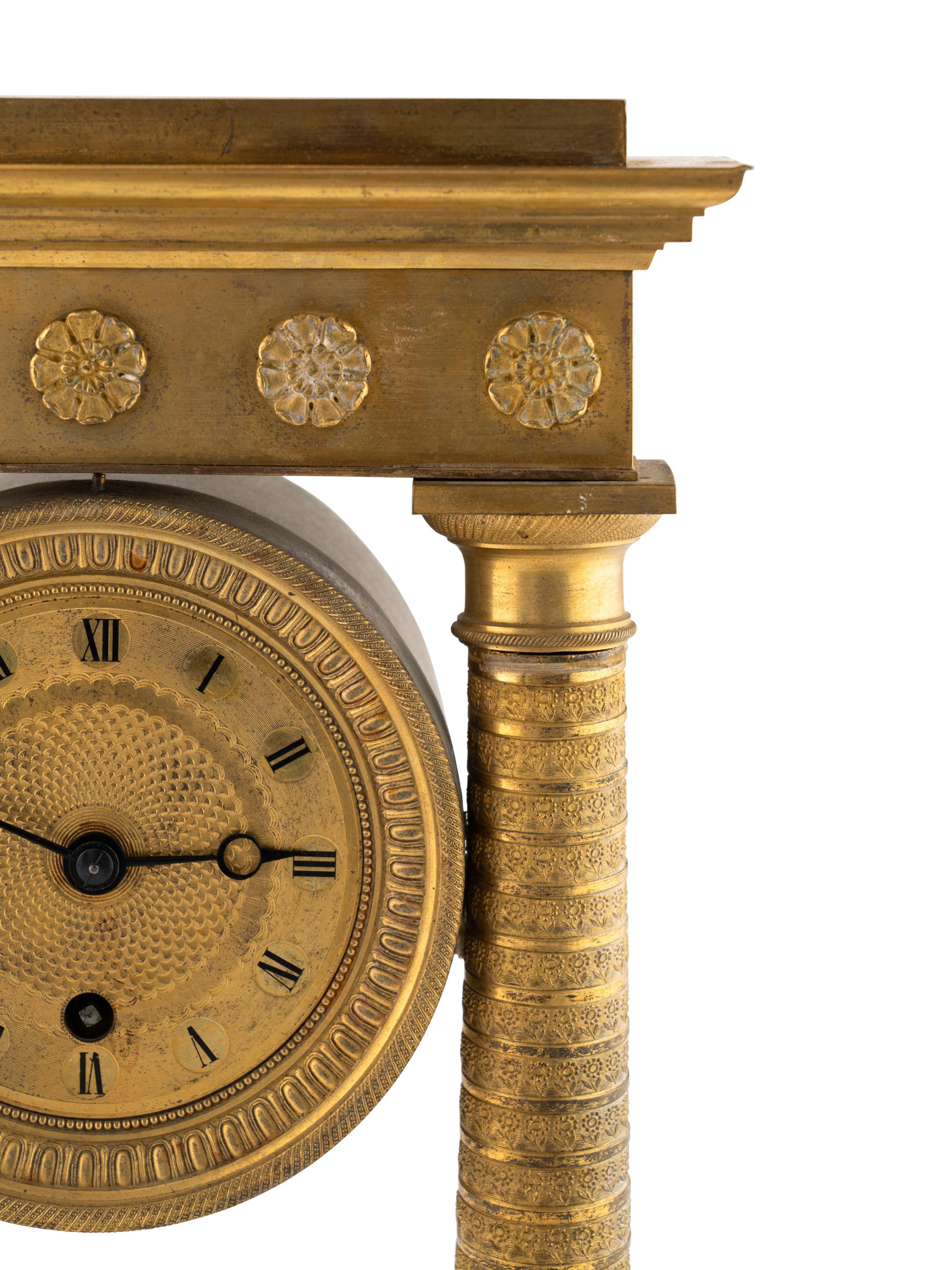 An Empire Gilt-Bronze Mantle Clock