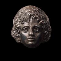 A Roman Silver Head and Two Roman Bronze Coins