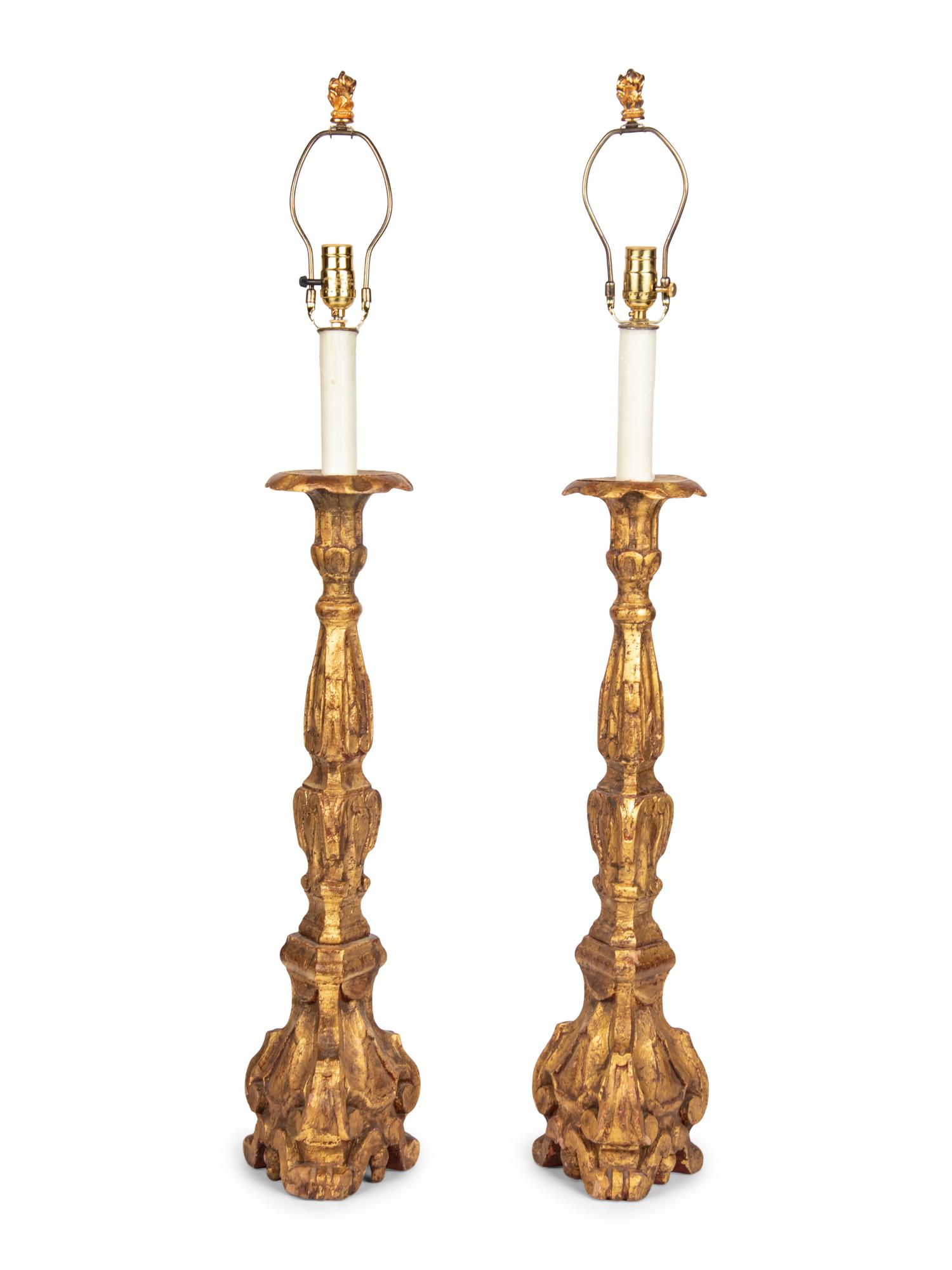 A Pair of Italian Giltwood Prickets Mounted as Lamps