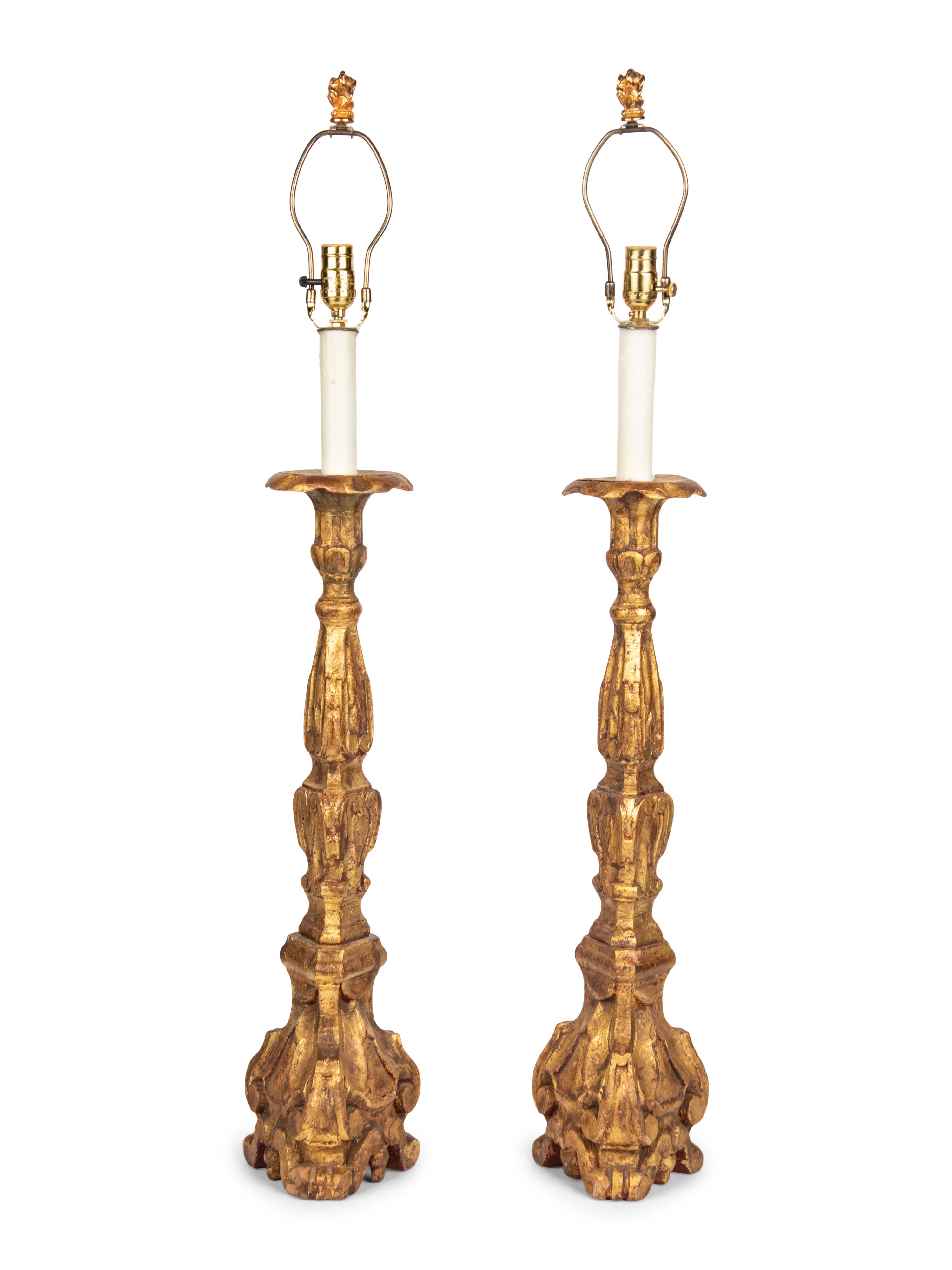 A Pair of Italian Giltwood Prickets Mounted as Lamps