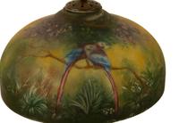 A Handel Patinated Metal Table Lamp With Reverse-Painted Glass Shade