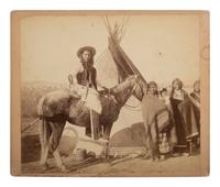 [NATIVE AMERICANS]. GRABILL, John C. (1849-1903), photographer. "A Pretty Group at an Indian Tent." Jack Redcloud brings the news of surrender and end of war to his lady friends . [Deadwood, SD], [1891].