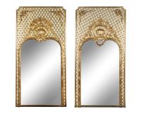 A Pair of French Painted and Parcel Gilt Trumeau Mirrors